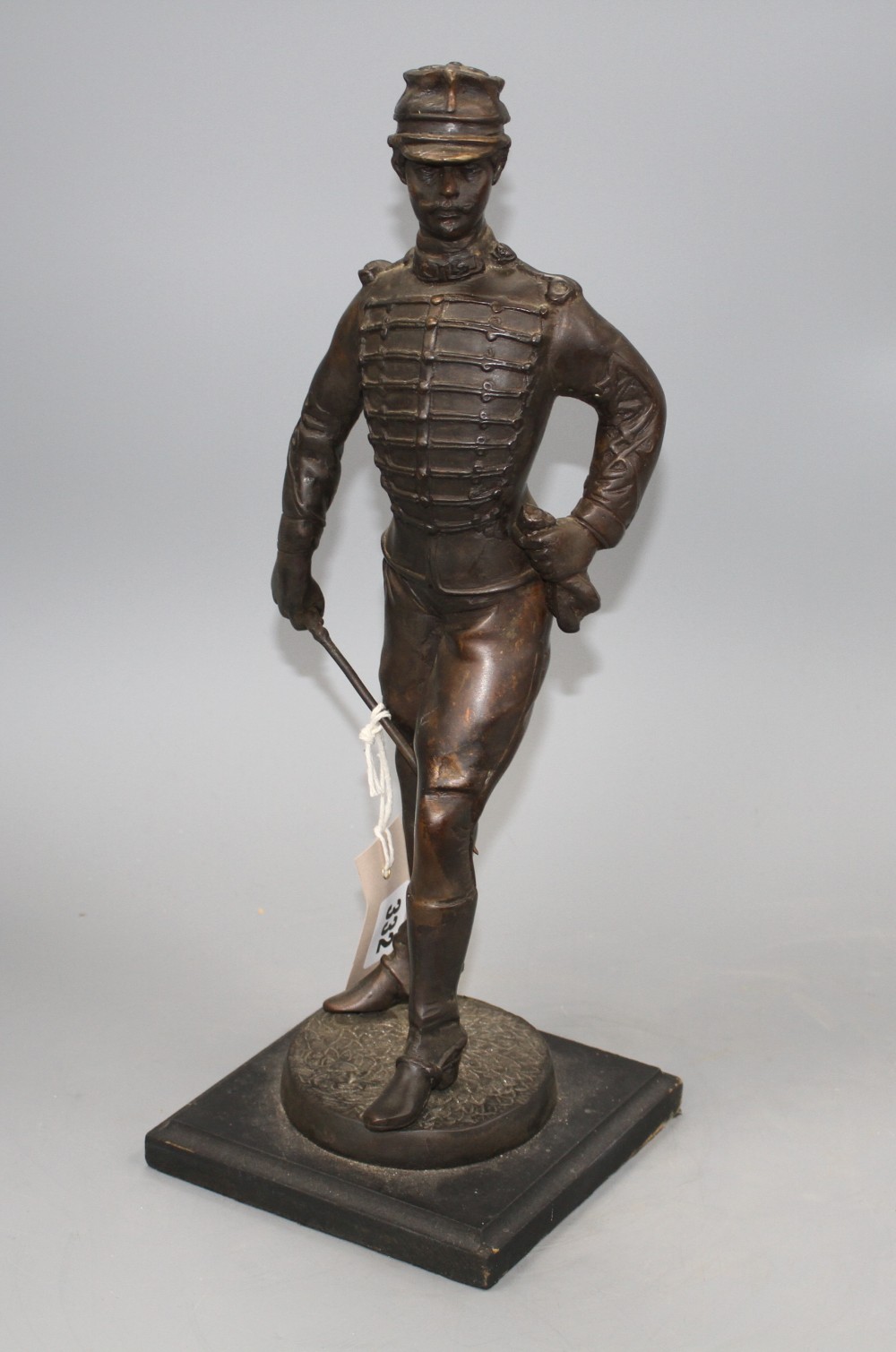 A bronze figure of a late 19th century Military officer, on ebonised plinth, height 38cm